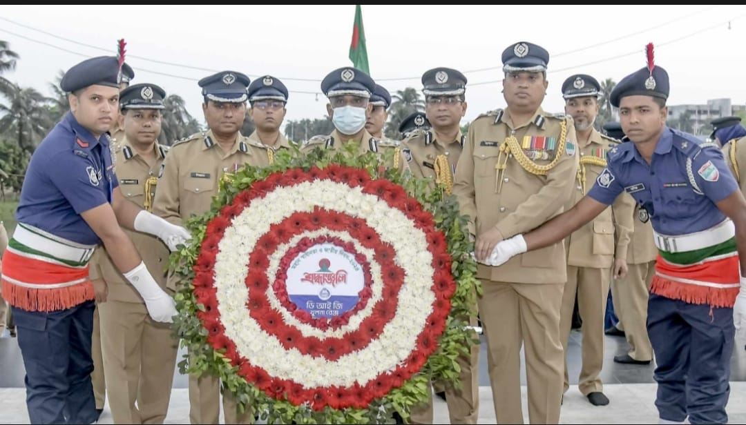 Khulna Range DIG Moinul Haque pays tribute by offering a floral wreath at Khulna Gollamari Martyr Memorial on Great Independence and National Day. Photo PID, Khulna